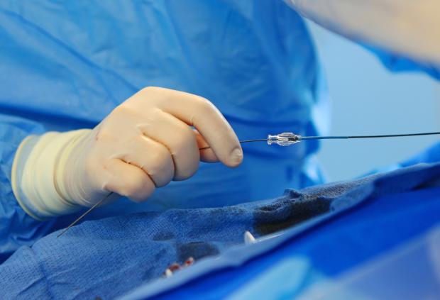 closeup of an endovascular device being used in the operating room