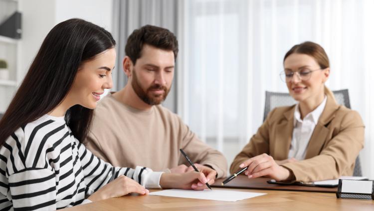 couple with paperwork