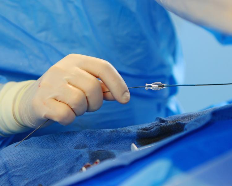 closeup of an endovascular device being used in the operating room