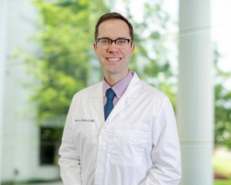 portrait of Doctor Aaron Kelkhoff with Saint Francis HVI