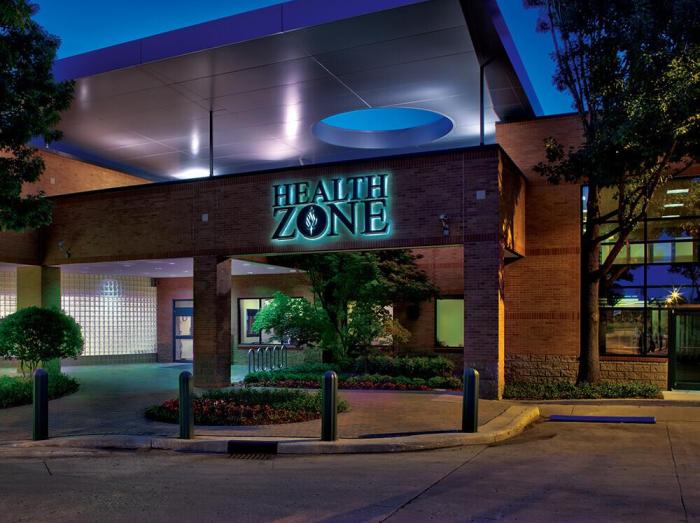 Exterior of HealthZone at Saint Francis showing main entrance at dusk
