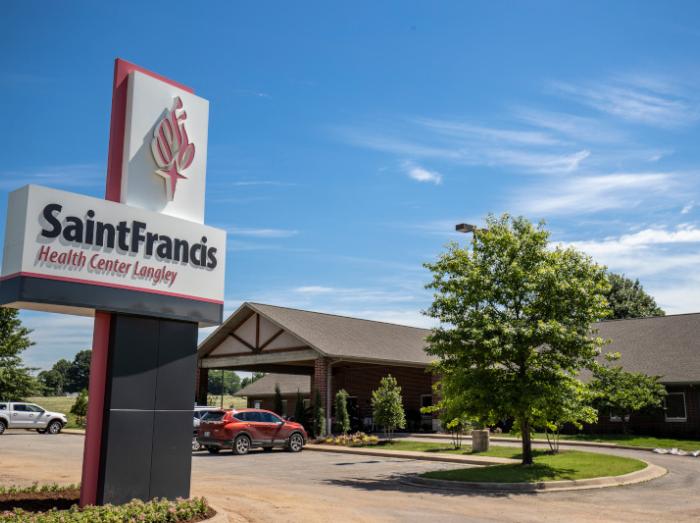 Exterior view of Saint Francis Physical Medicine and Rehabilitation Langley with sign in foreground