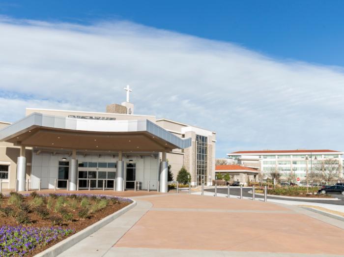Exterior view of Saint Francis Hospital South on a sunny afternoon