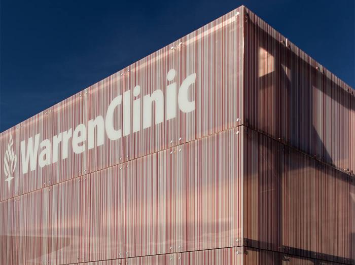Corner of Warren Clinic building with Warren Clinic logo