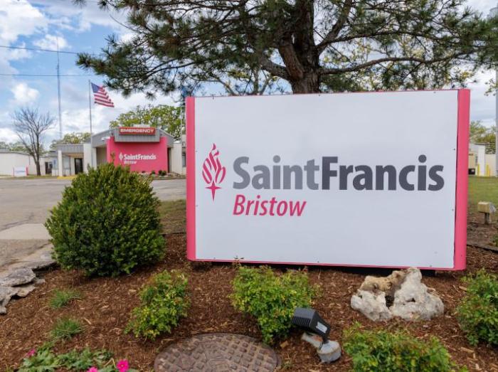 Exterior view of Saint Francis Bristow Emergency department with outdoor sign in foreground