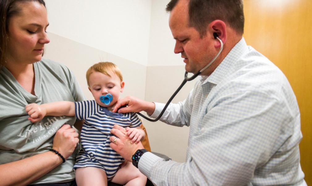 Baby at Pediatrician with his Mom