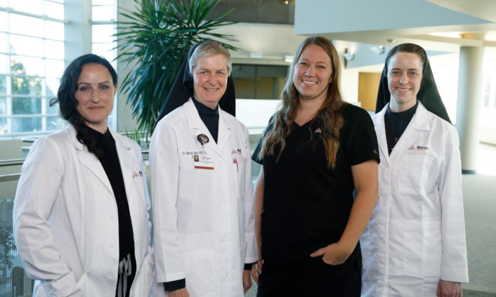 Group photo of Marian Medical Clinic doctors and nurses