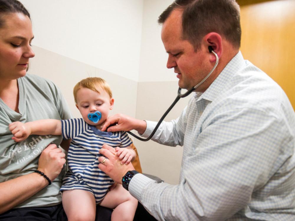 Baby at Pediatrician with his Mom